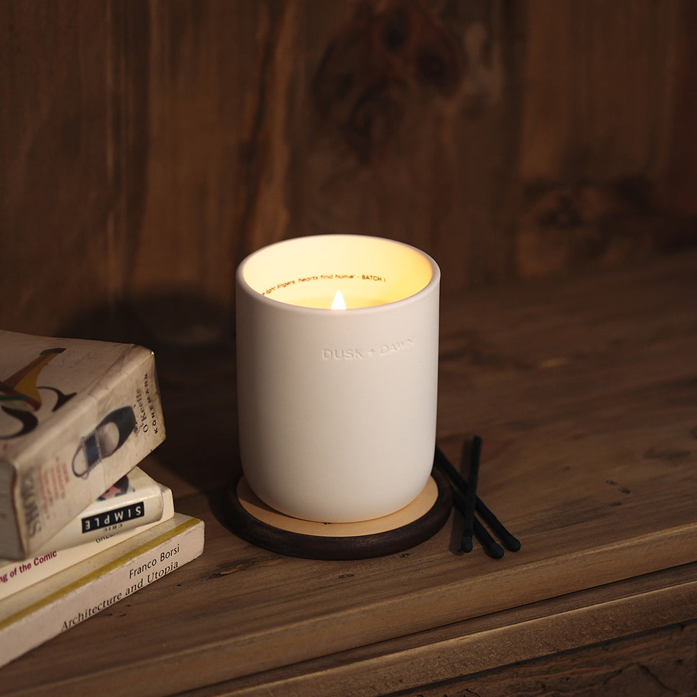 Halo Matcha Candle Lit On A Rack