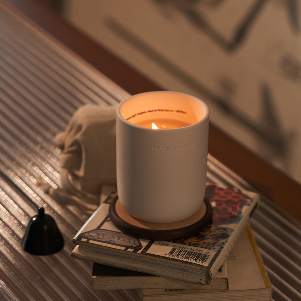 Halo Menthe Candle Lit On Table